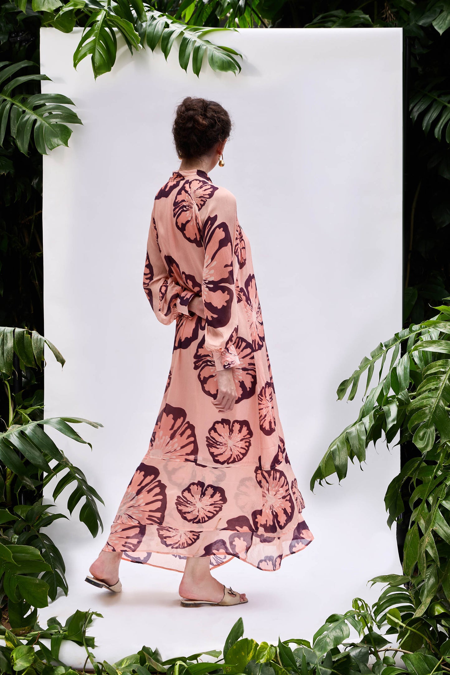 Close-up of Rosaria Dress — gathered sleeves and oversized floral motifs