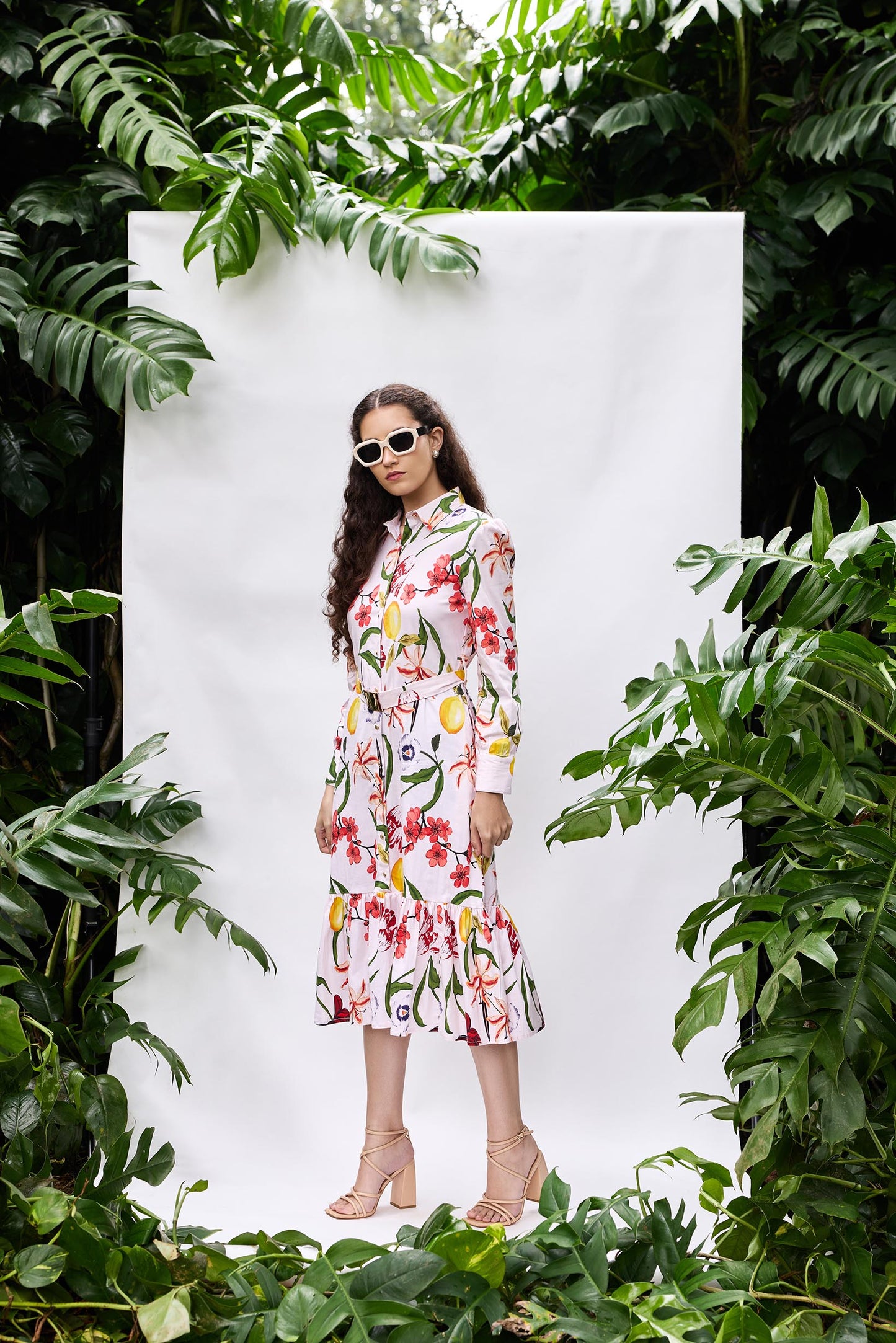 Model wearing Bouquet Dress — printed shirt dress with belt and side pockets