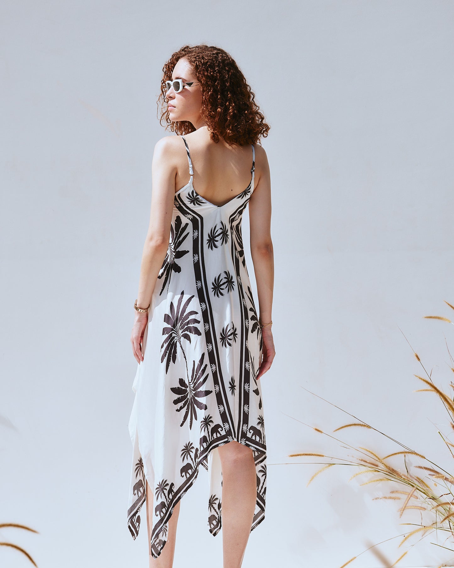 Luxury white resort wear dress by VA RA – bar to beach transition outfit for modern Indian women