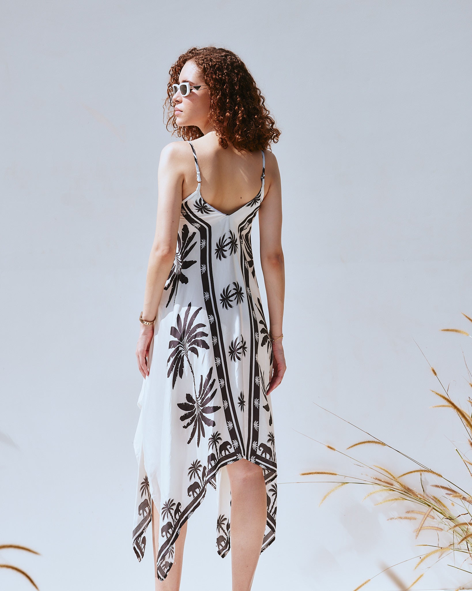 Luxury white resort wear dress by VA RA – bar to beach transition outfit for modern Indian women