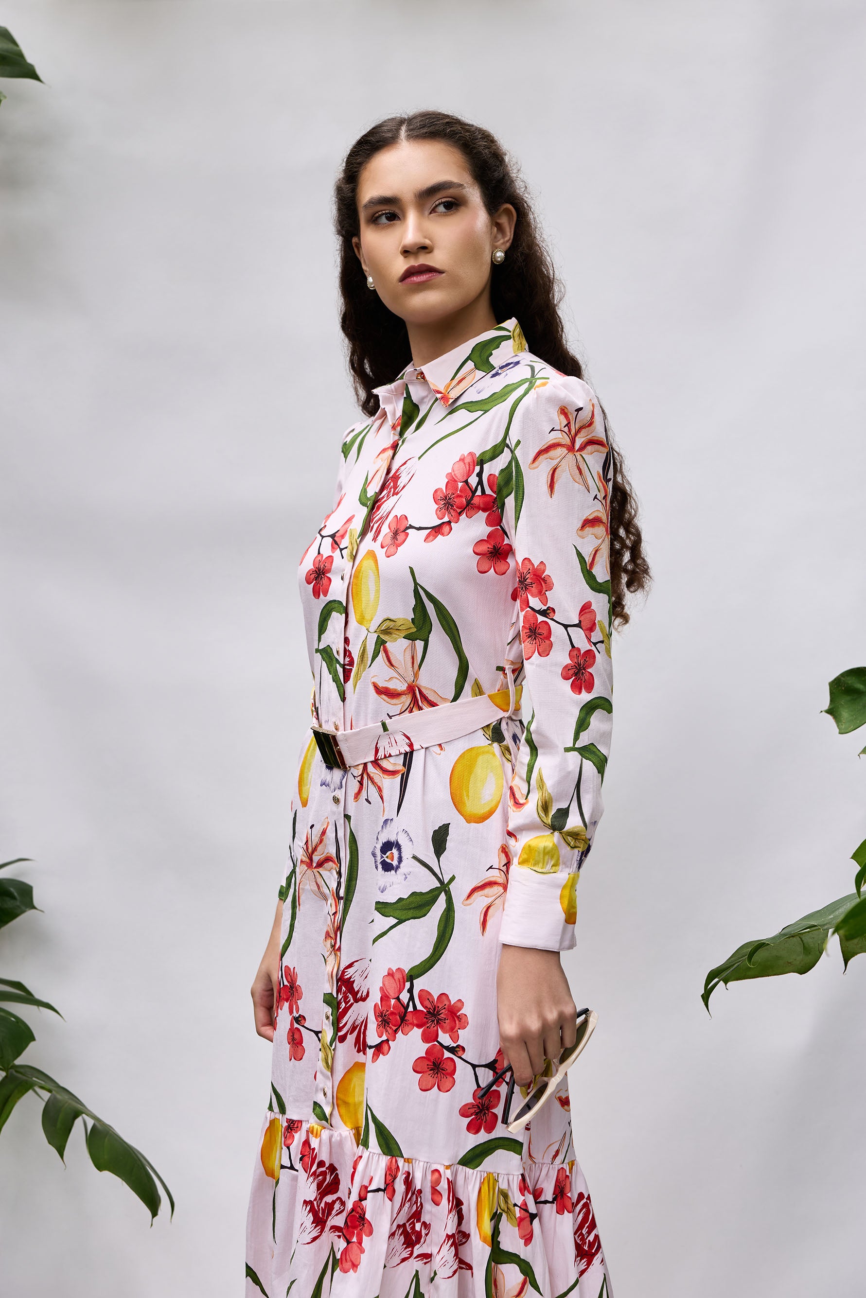 Close-up of Bouquet Dress — cotton lycra floral fabric with gold buttons