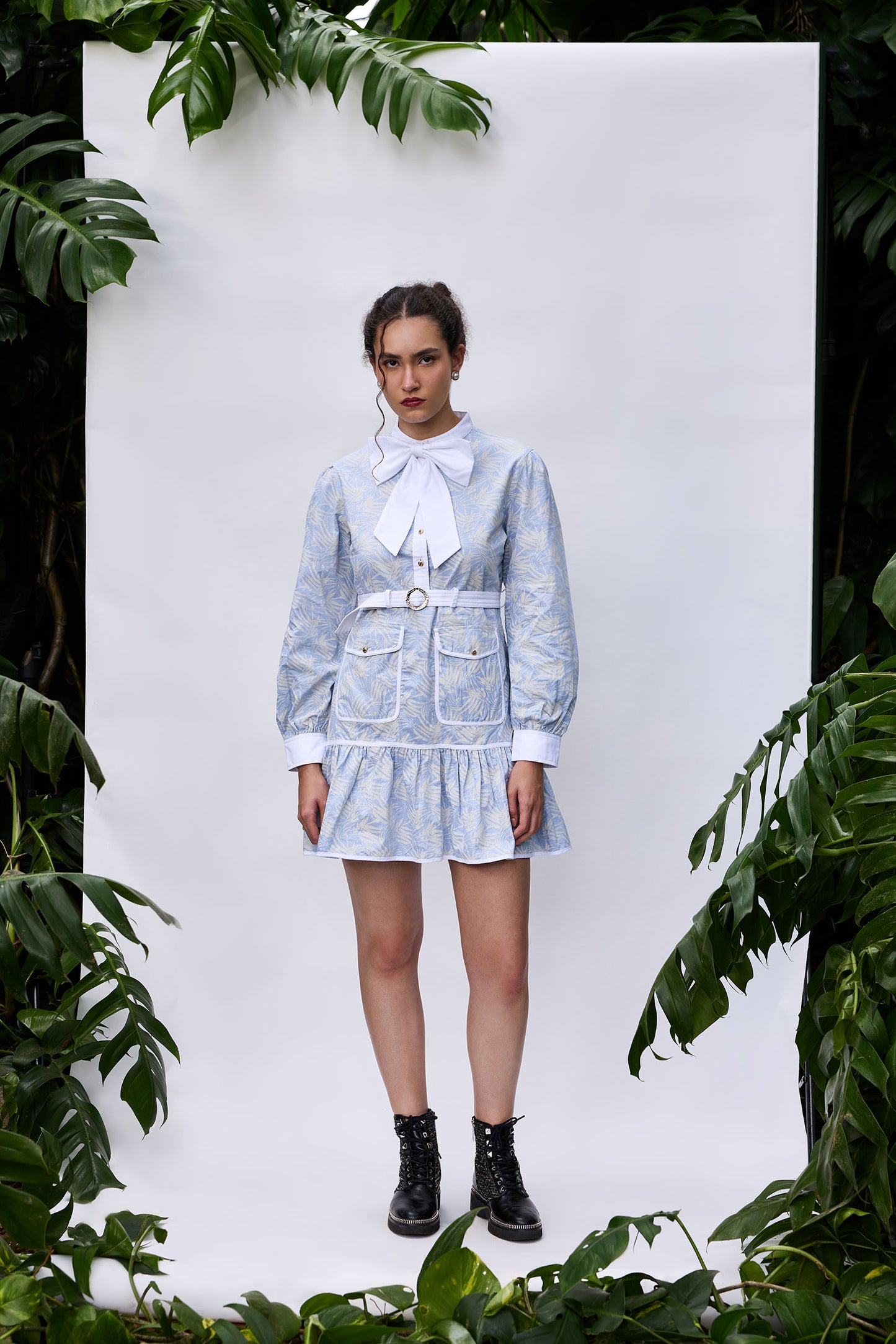 Front view of blue palm print utility mini dress with pockets – VA RA