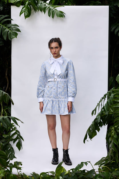 Front view of blue palm print utility mini dress with pockets – VA RA