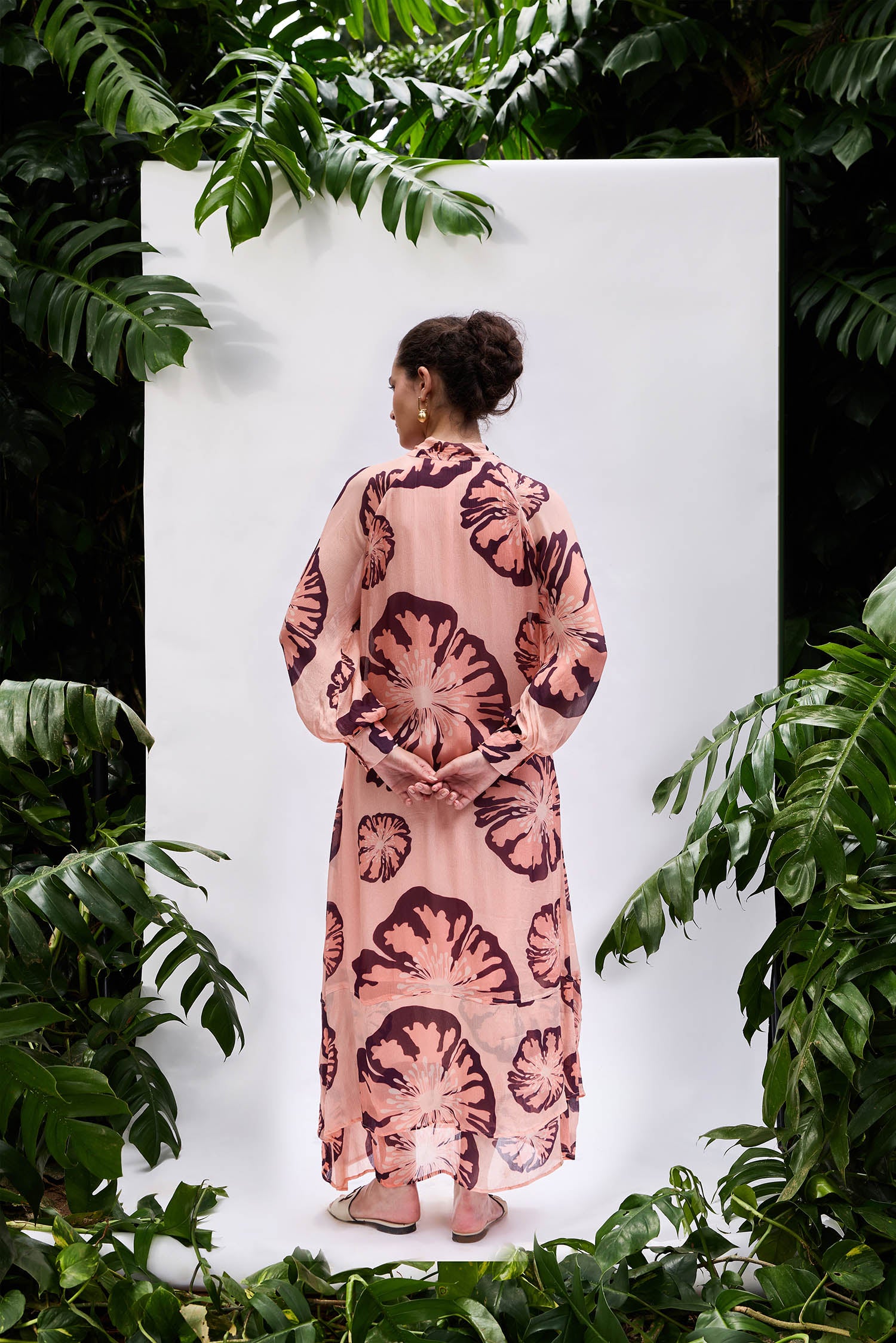 Back view of Rosaria Dress — relaxed fit floral maxi, tie-neck detail