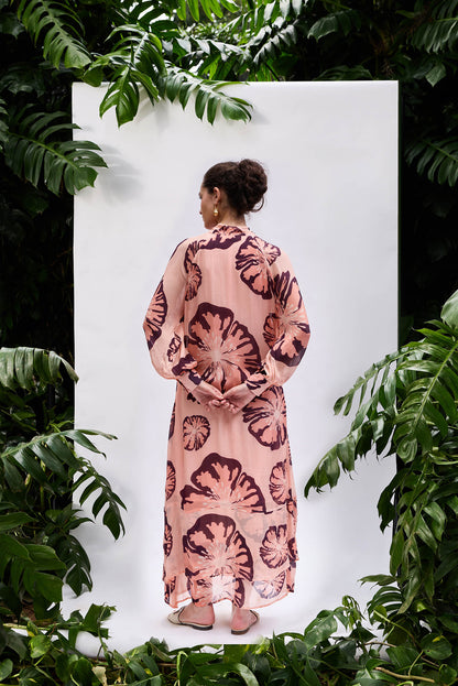 Back view of Rosaria Dress — relaxed fit floral maxi, tie-neck detail