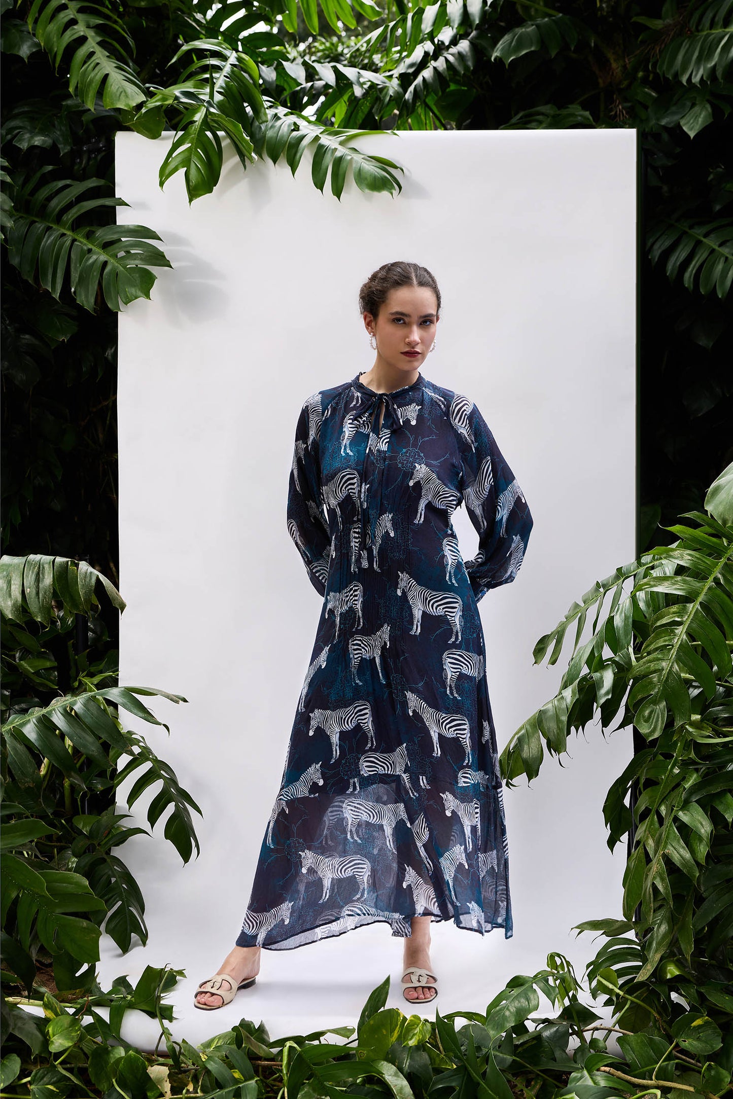 Model wearing Sapphire Zebra Pintucked Maxi — relaxed resort-wear silhouette in sapphire blue
