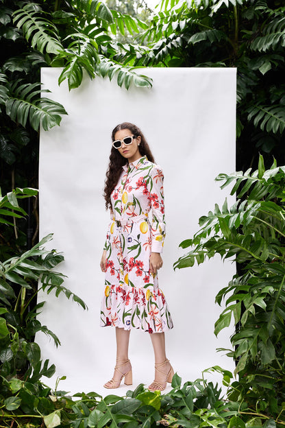 Model wearing Bouquet Dress — printed shirt dress with belt and side pockets