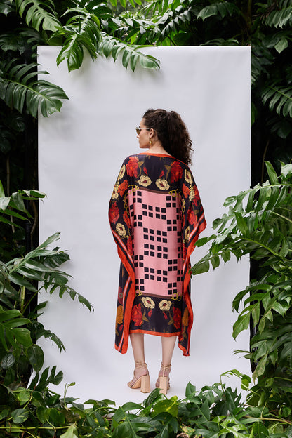Back view of Rosette Kaftan — relaxed fit and vibrant floral pattern