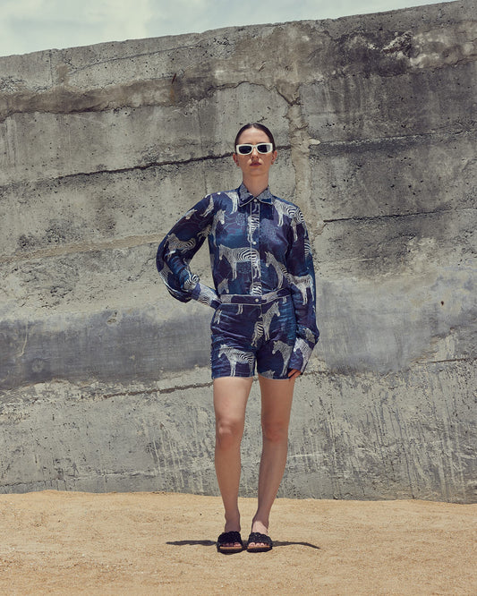 VA RA Sapphire Zebra Safari Jumpsuit – luxury women’s jumpsuit with bold sapphire zebra print